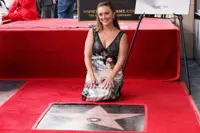 Carrie Fisher receives posthumous star on Walk of Fame on 'Star Wars' day