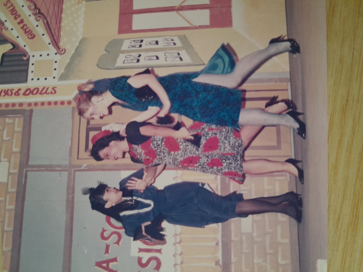 Law and Pan (middle) in a Guys And Dolls stage production in 1987.