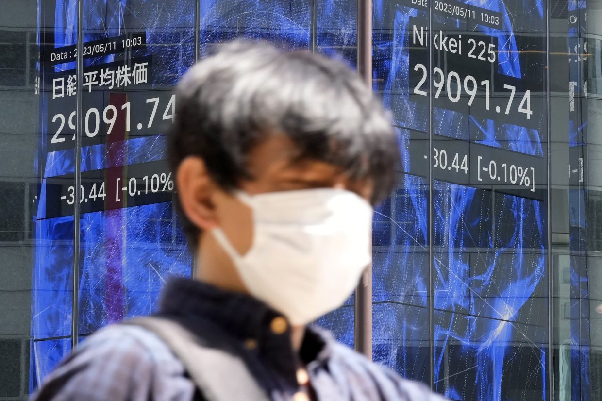 Asian markets struggle as traders unmoved by US inflation data | The Star