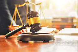 Datuk and brother acquitted of making false claims