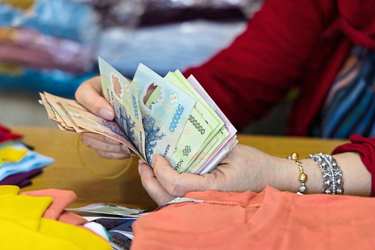 Dong is one of the most stable currencies in Asia KLSE Screener