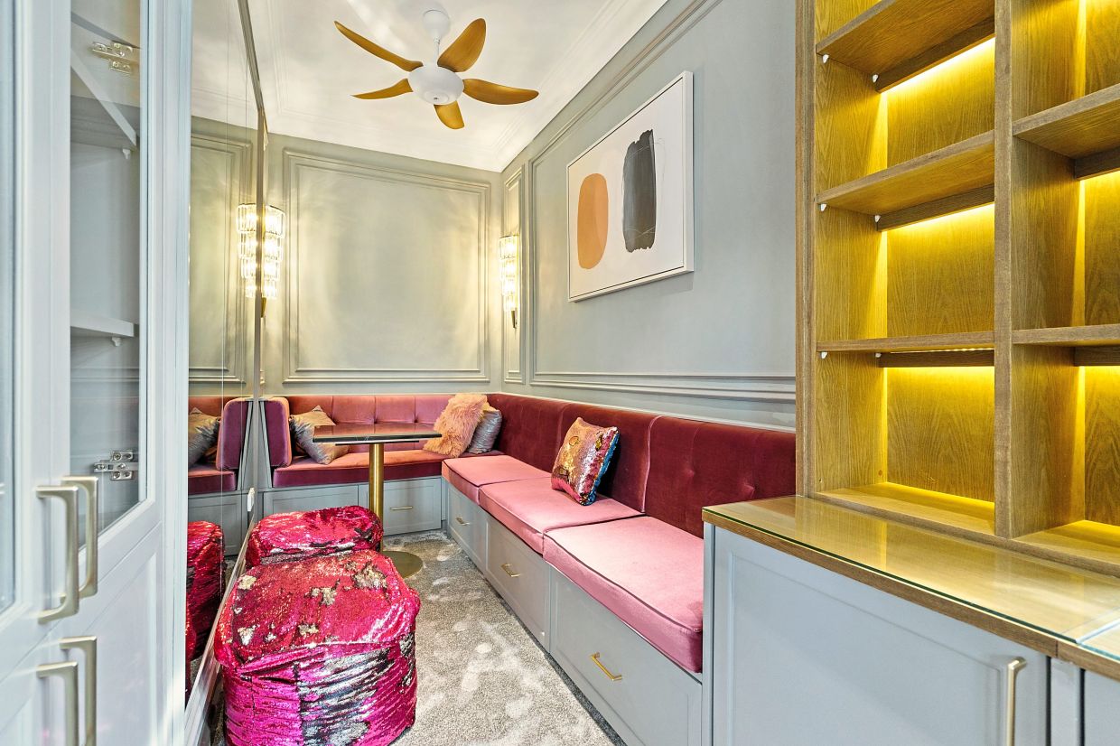 The girls’ room was fitted with cosy reading nooks mixed with textures and splashes of blush pink.