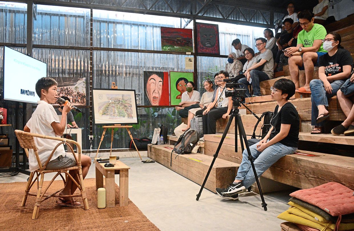 Slowork Publishing founder Huang Pei-Shan (left) speaking about her experiences during a sharing session titled 'The Road Taken: Making Documentary Comics'. Photo: The Star/Jeremy Tan