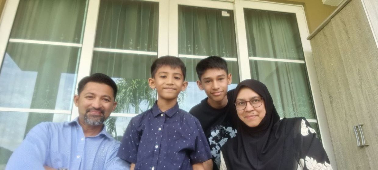 Ziana and her husband M Izuan Khan with their boys, Ziyad Siddiqi Khan (second from right) and Ali Farouqi Khan. — ZIANA ZAINAL