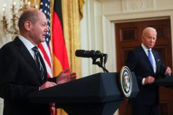 Germany's Scholz publicly backs Biden over Trump for re-election