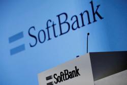 SoftBank pushes back after S&P cuts rating deeper into junk