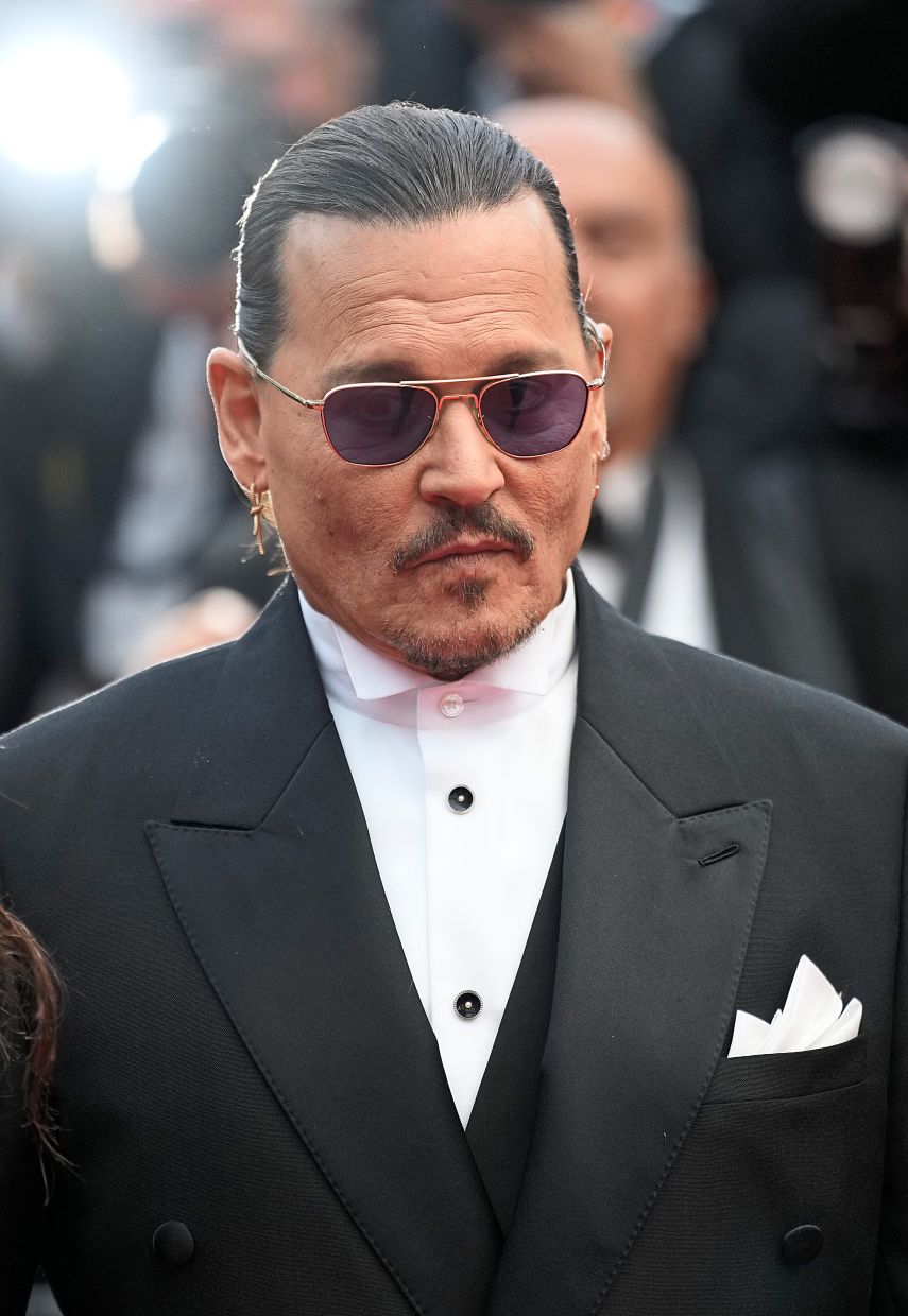 Johnny Depp went for the classic look with a Dior suit. Photo: AP