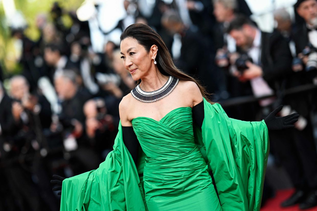 Tan Sri Michelle Yeoh wore Balenciaga couture for one of her appearances. Photo: AFP