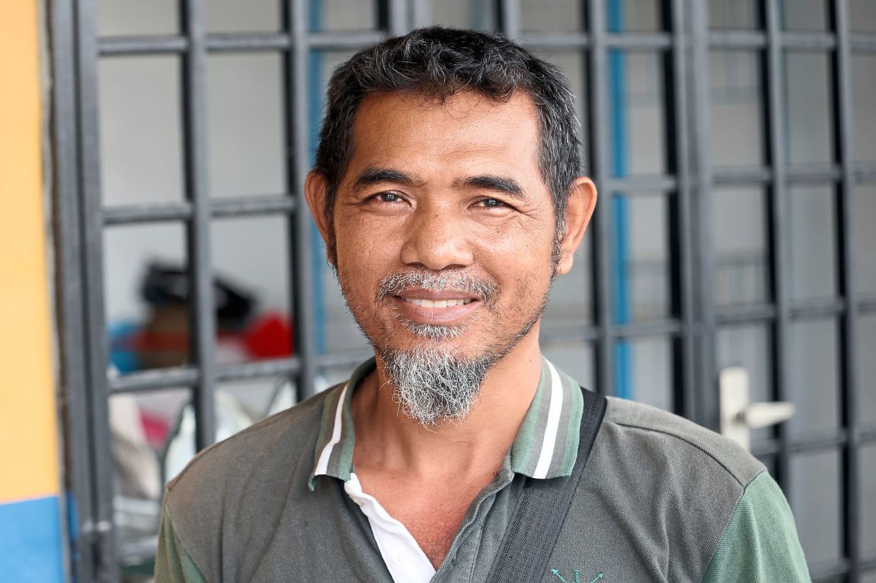 Mohd Baharani was glad friends helped to salvage his belongings before his stall was demolished when he was away in Kelantan.