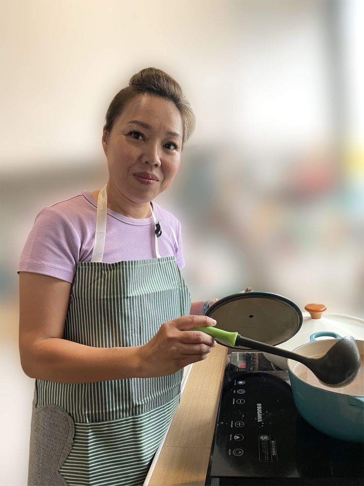 A serving of spice: Bandar Baru Klang Pusat Wanita Berdaya supervisor Michelle Teoh Ngai Fong contributed the recipe for Kam Heong Crab, a dish she says is inspired by her late grandmother.