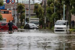 One dead and two missing in Japan after heavy rain from Typhoon Mawar