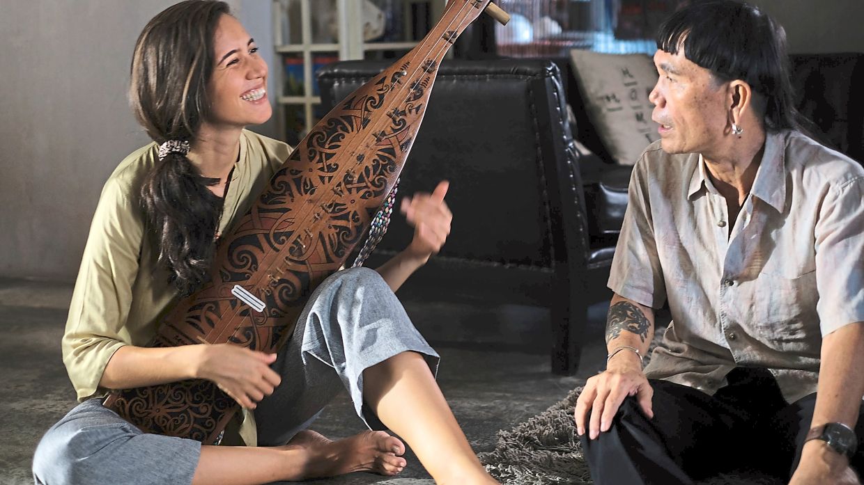 Alena received her sape training from renowned Sarawakian sape master Mathew Ngau Jau. Photo: Handout