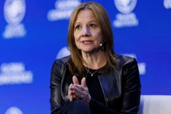 GM embraces Tesla's EV charging system, Wall Street cheers