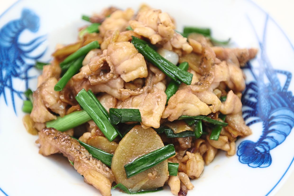 Stir-fried fish slices with ginger and spring onion is a delectable Cantonese dish that’s easy to prepare and goes well with steamed rice. — Photos: LOW BOON TAT/THE STAR