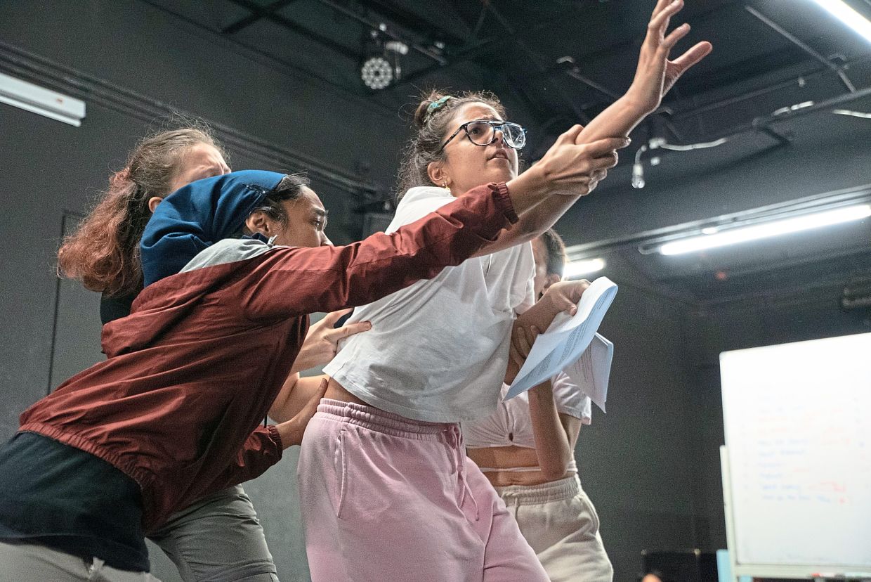 Sharanya (in white) seen in a rehearsal for 'Saturn Return', Theatresauce’s third production of 2023. Photo: Abdul Sami Shahid 