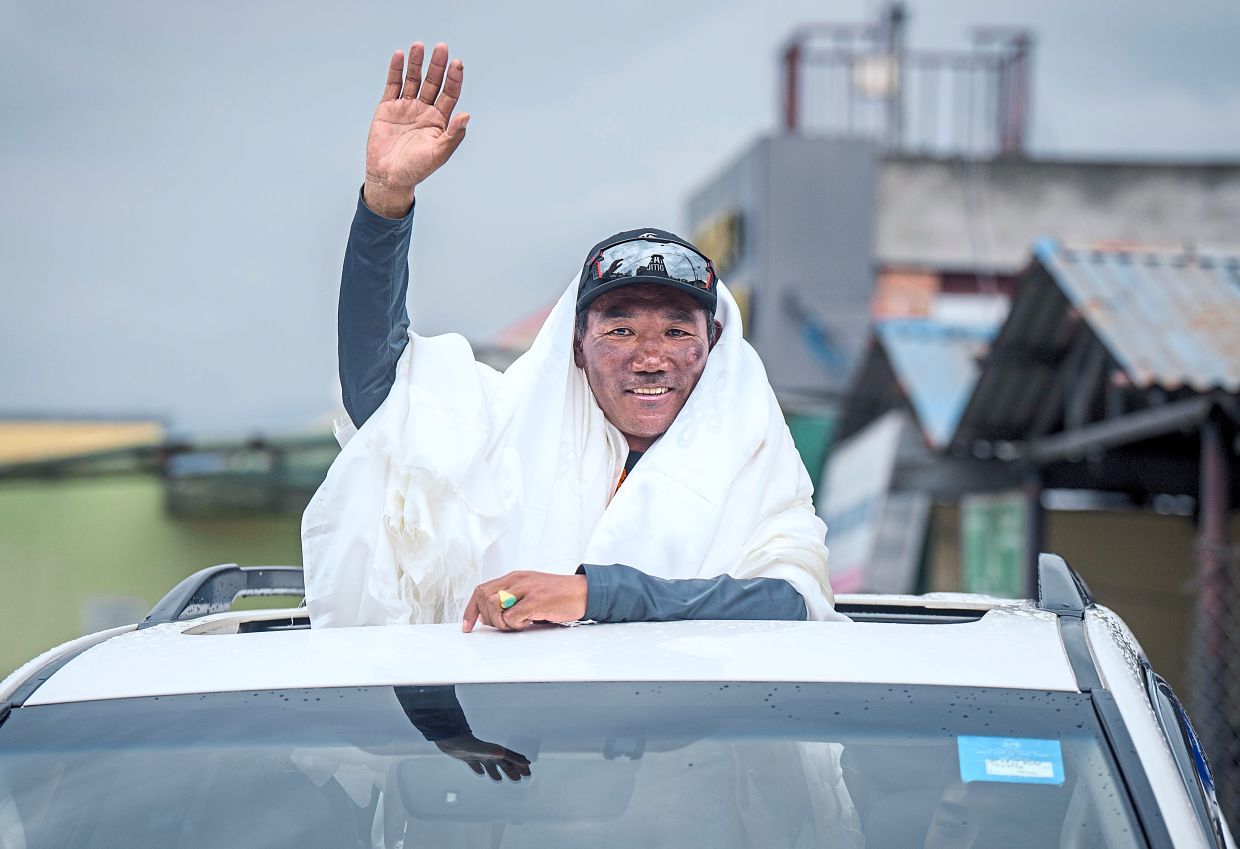 Kami was given a grand welcome back in Kathmandu after scaling Mount Everest for the 28th time in May. — AP