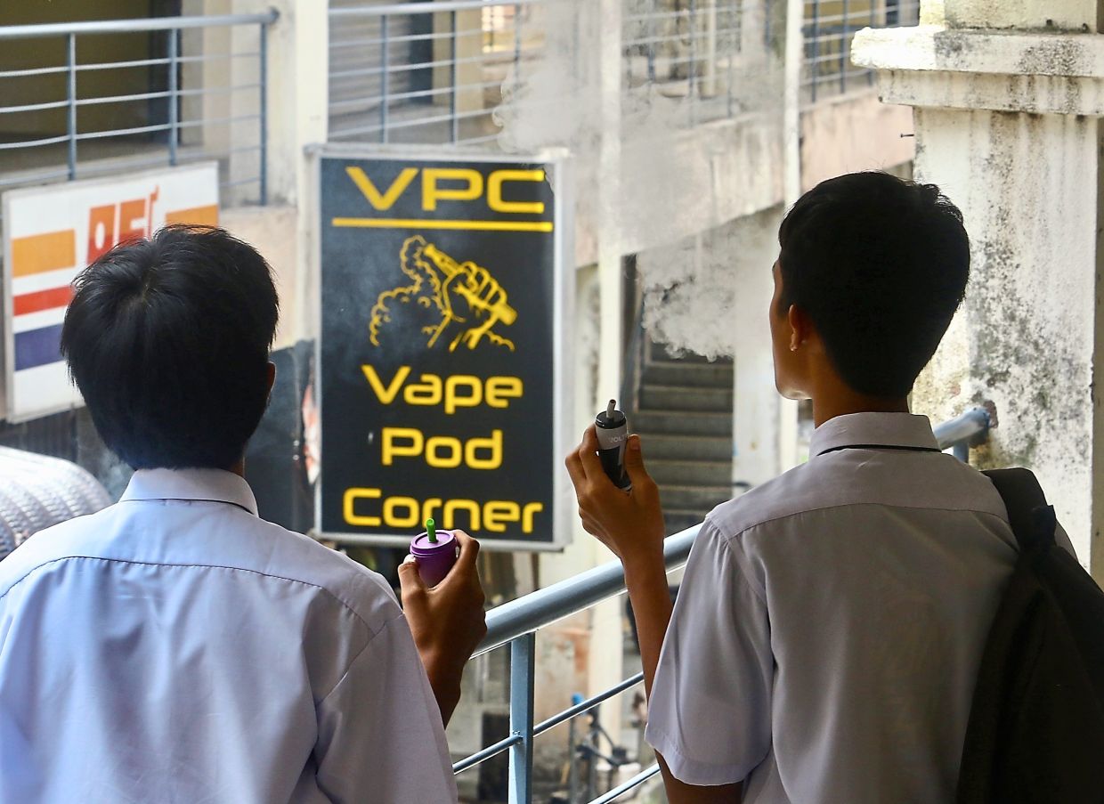 Hard to quit: Youths in school uniform vaping freely is an increasingly common sight nowadays.