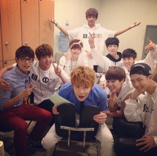 Jang (first row, middle) poses with former 'After School Club' host Eric Nam and BTS. Photo: @ohboyitsbts/Twitter