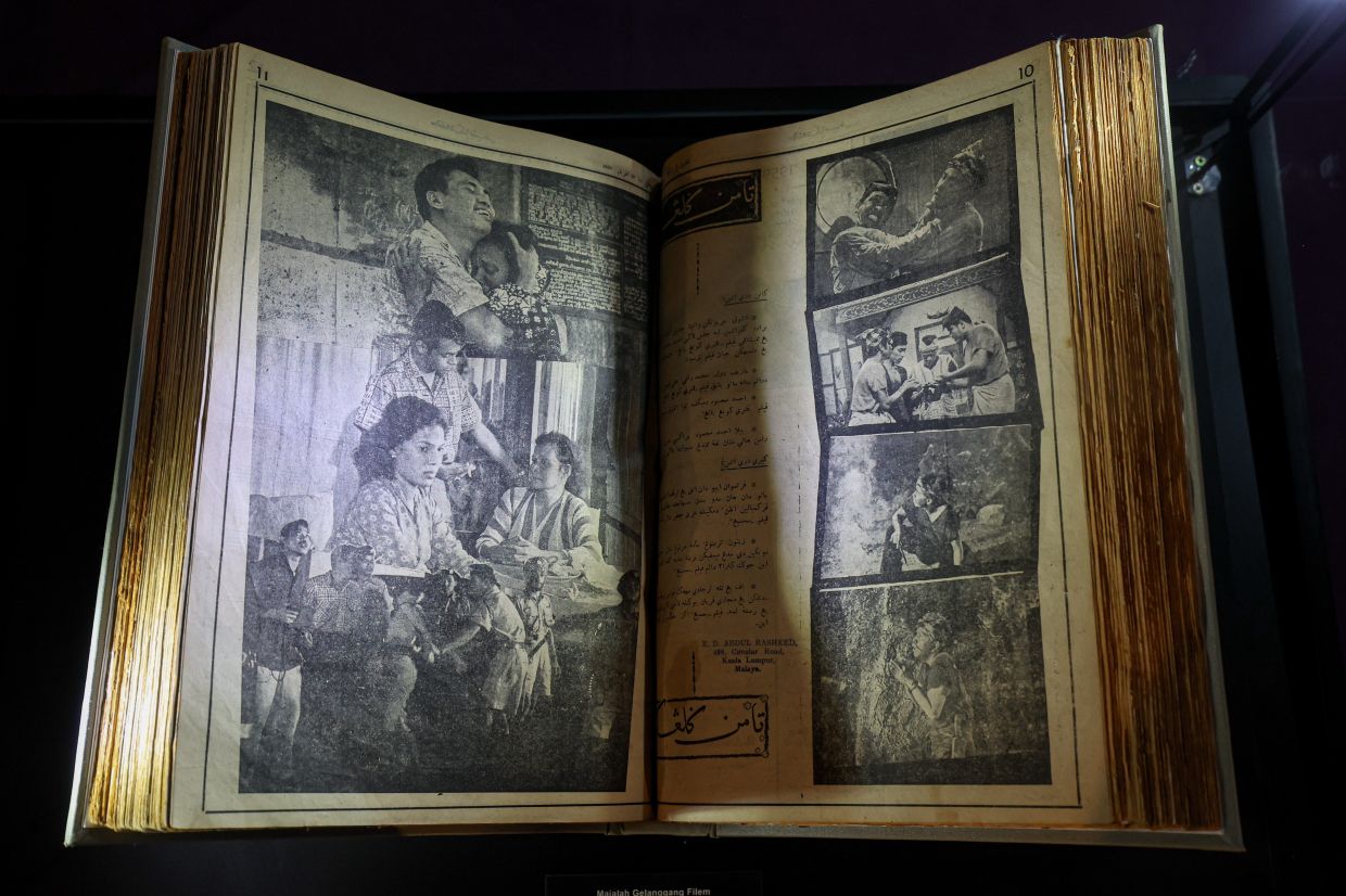 A bound volume of the entertainment magazine ‘Gelanggang Filem’, which captured the pulse of local cinema in the late 1950s and 1960s, is one of the highlights at the exhibition. Photo: Bernama