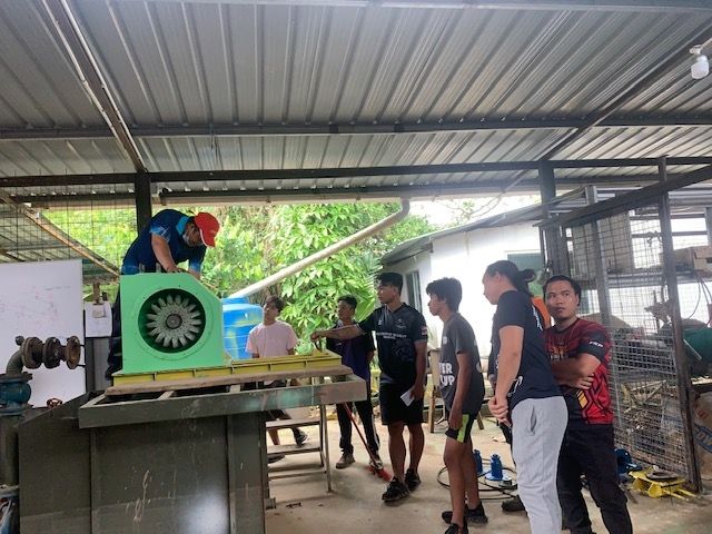 Tonibung members training the micro hydro operators at their Create Borneo Centre in Penampang, Sabah.