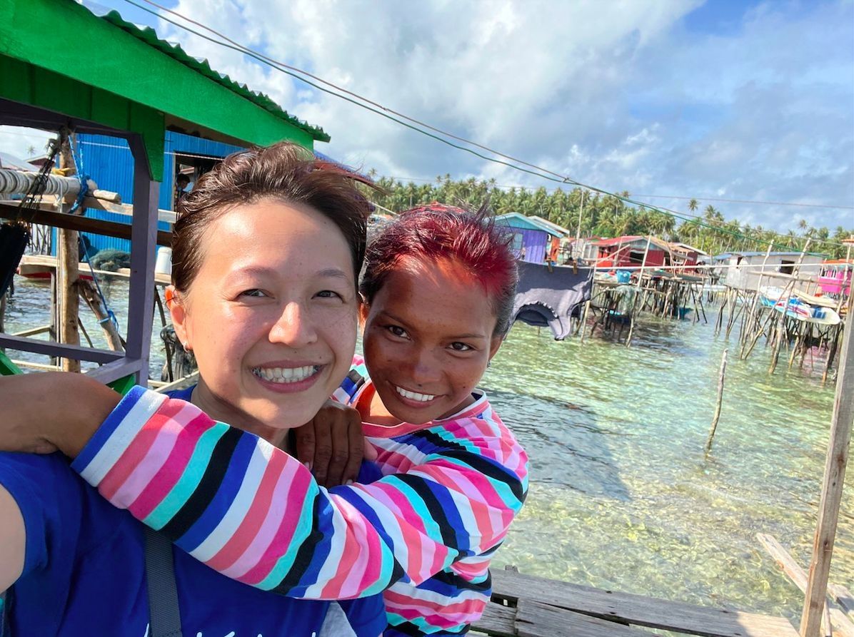 Chuah (left) with Ginara, now 18, whom the former met 10 years ago.