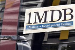 Police hunting more 1MDB suspects
