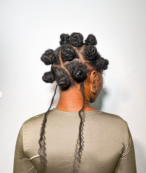 Twisting your hair into Bantu knots are a great way to achieve bouncy curls. Photo: Instagram/Maeve Nonye