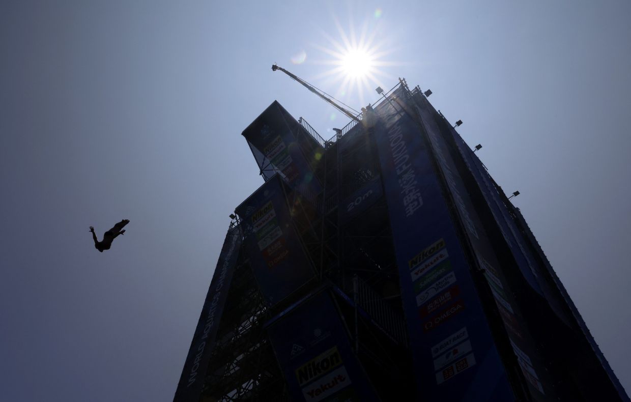 Cooper in action during the men’s 27m high dive. — Reuters