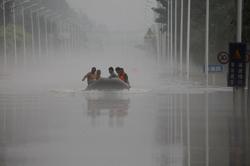 China floodwater diversions to populated areas unleash wave of online anger