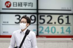 Asian markets fluctuate after mixed US jobs report