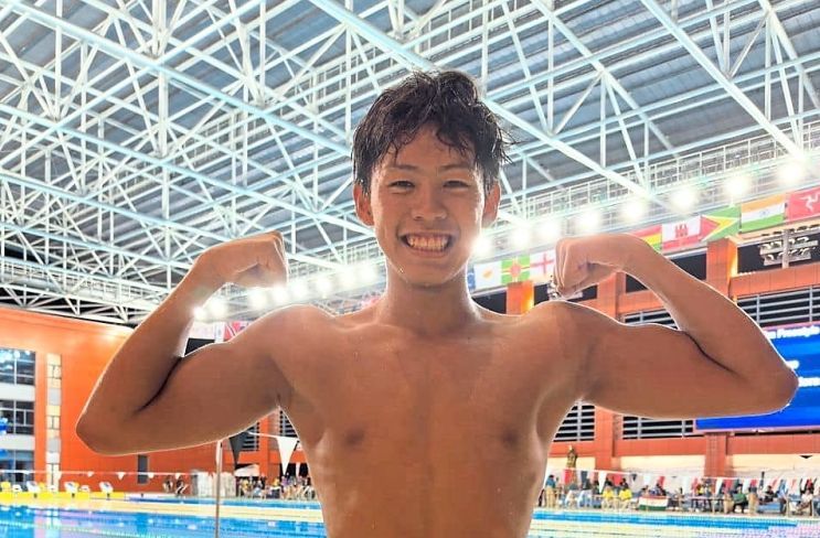 Flexing it: Swimmer Henry Goh won gold for Malaysia in the men’s 200m butterfly at the Youth Commonwealth Games. He was representing the country for the first time.