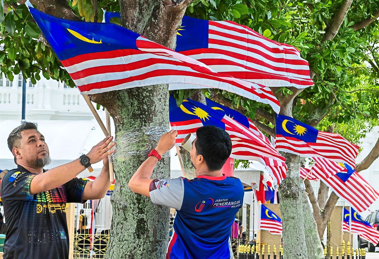 Moving forward: With just two weeks left to National Day, it’s now time to put Malaysia first and hoist our Jalur Gemilang in the name of solidarity and unity! — KT GOH/The Star