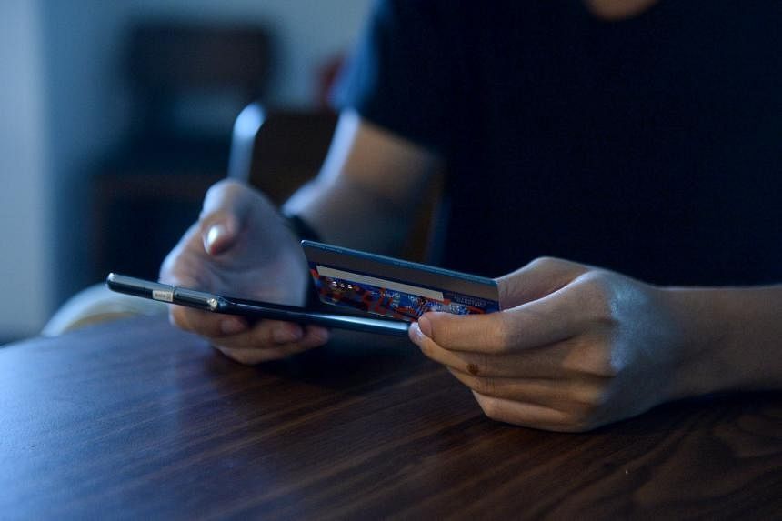 Woman loses over S$20k from credit card and bank accounts after downloading third-party app - Vimarsana News