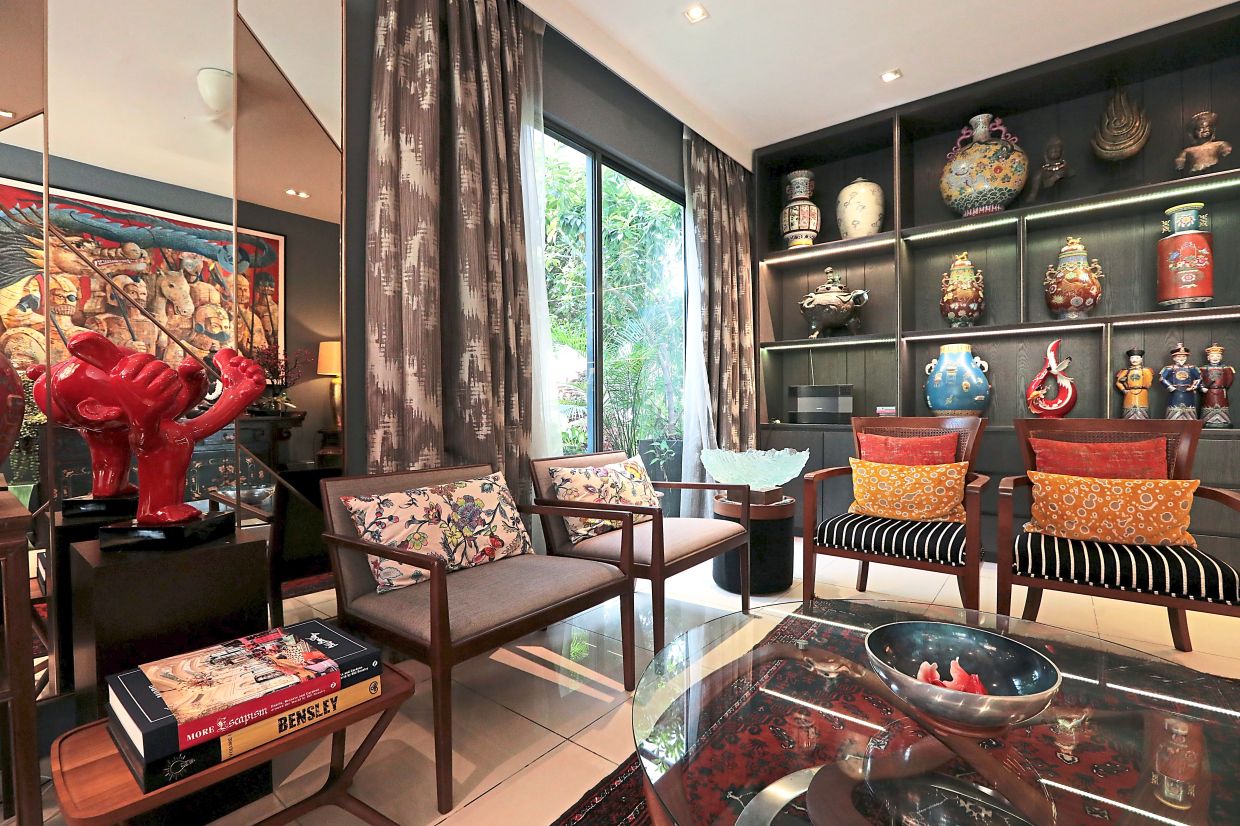 Chiam's extensive collections of paintings, artefacts and artwork fill almost every corner of the home.