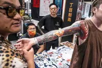 Tattoo artists make their mark at Hong Kong fair