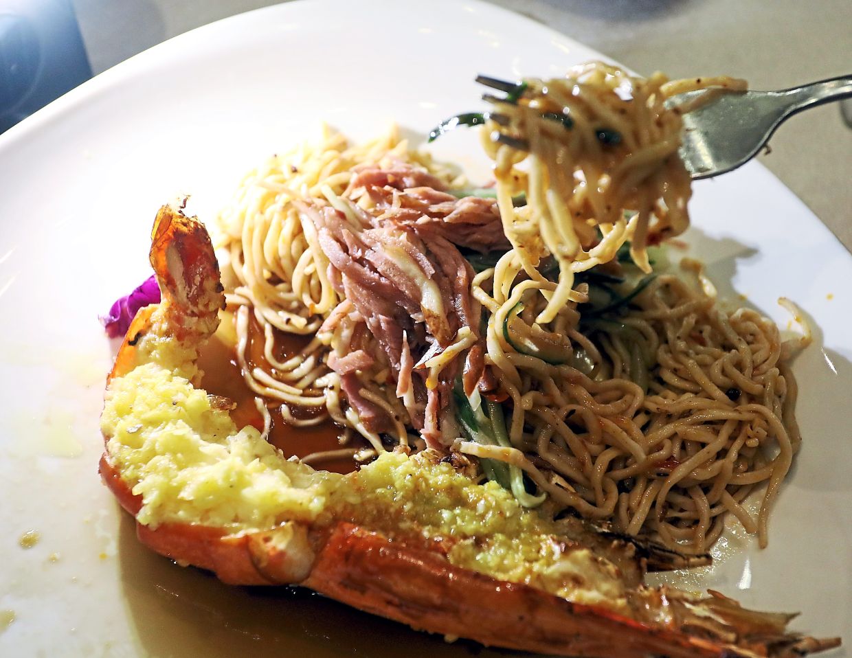 Cold Ramen with Aged Vinegar Dressing and Oven-baked Butter Garlic River Prawn at Red Chinese Cuisine, Pullman Kuala Lumpur City Centre. — Photos: AZLINA ABDULLAH/The Star