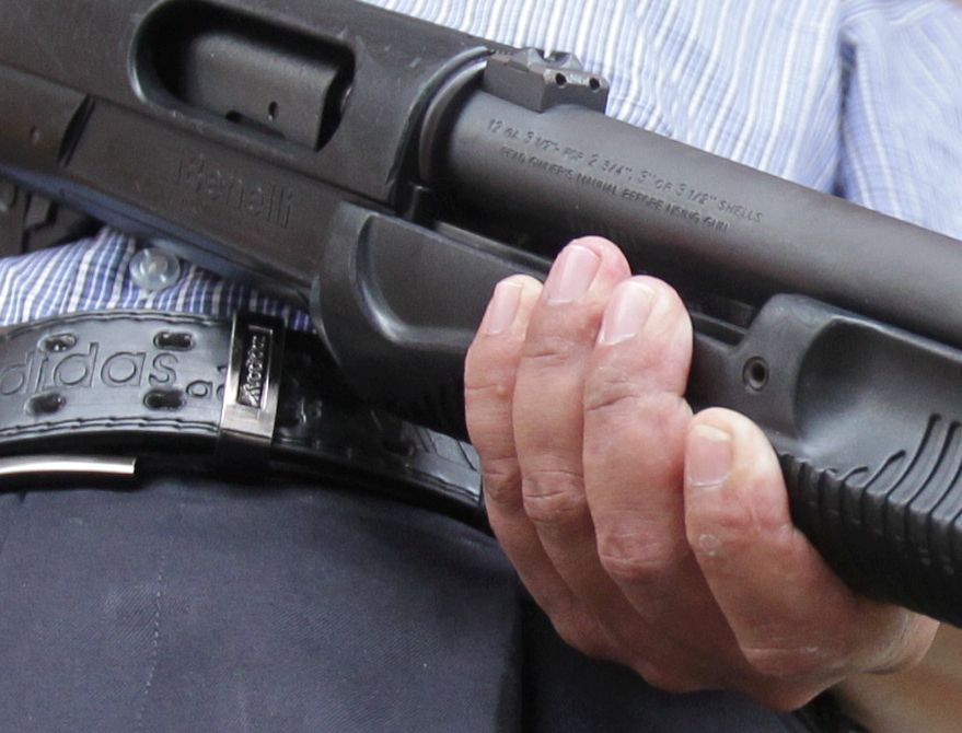 Three hurt in bank after auxiliary cop accidentally discharges gun - Vimarsana News