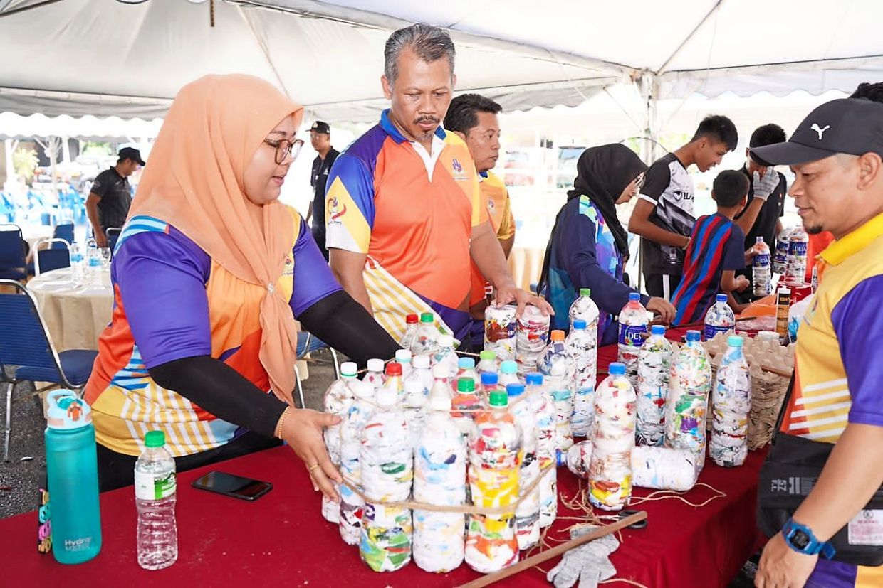 Yazid overseeing recycled bottles during the National Denai Sungai Programme at Seri Selera Wira Damai, Gombak.