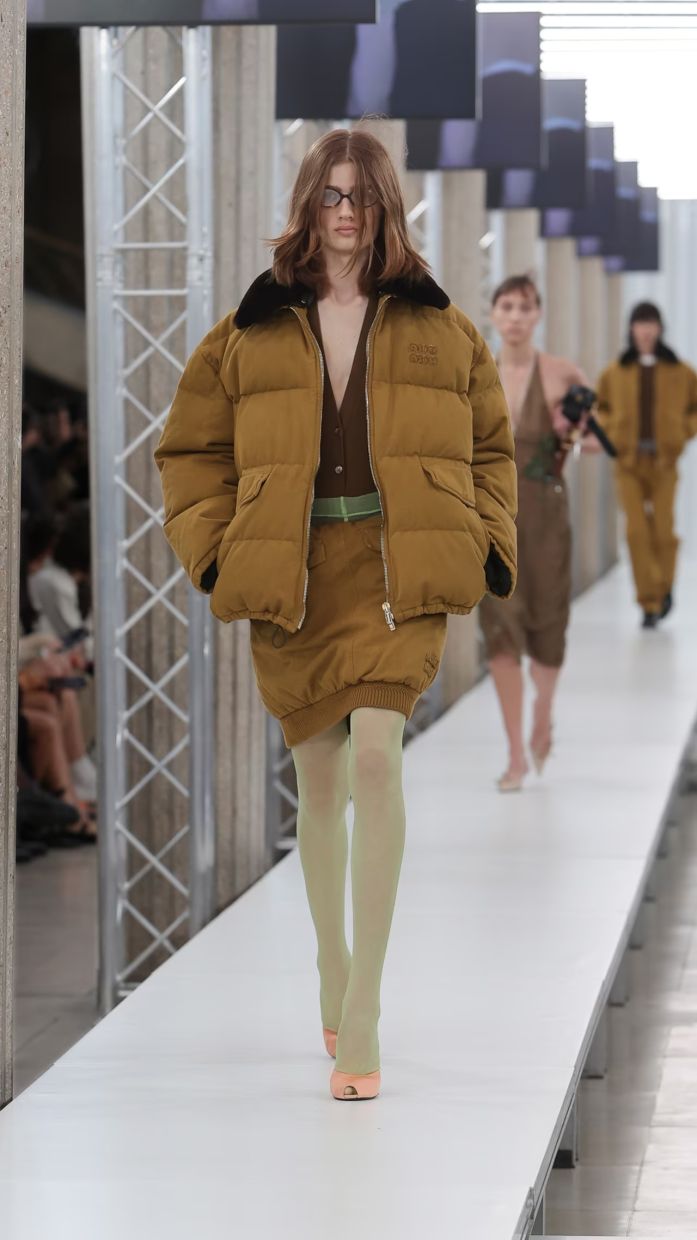 Labels are turning to coloured tights to jazz up outfits. Photo: Miu Miu