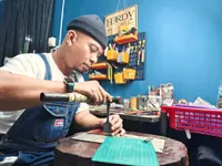 Kelantanese quits job as a graphic designer to craft leather items