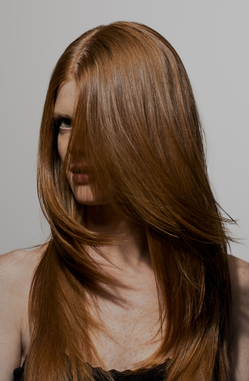 Spicy auburn, or any reddish hues are a huge trend this season. Photo: Sisley