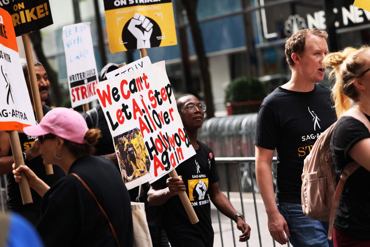 Both writers and actors unions started strikes in the US to fight for fair compensation, stronger workers' rights, greater employment protections, and consent and proper compensation when artificial intelligence is used. Photo: AFP