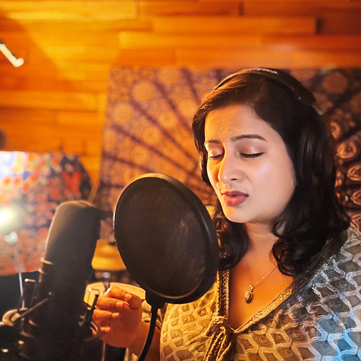 Music composer Rekha Raveenderen uses her voice as part of the music composition. Photo: Rekha Raveenderen