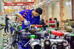 Pace of China’s industrial-profit slump eases