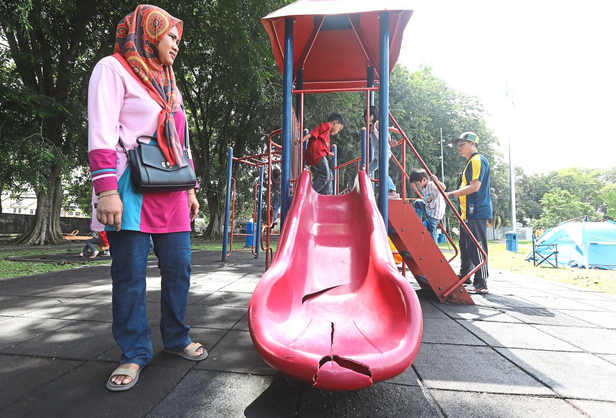 Azy Yati  says most playground equipment such as the slides are broken and dangerous.