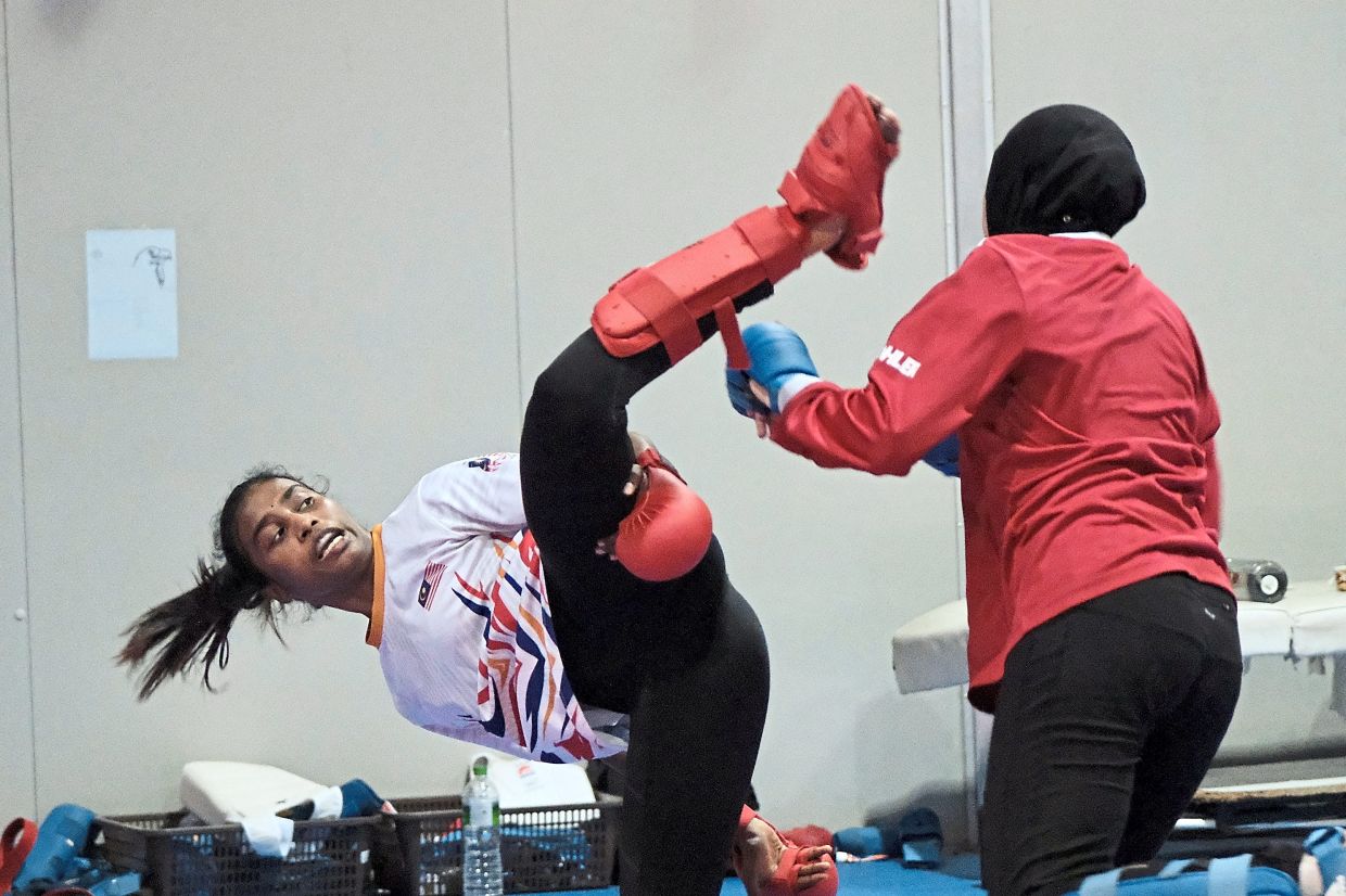 Other Sports: Old knockout system could boost bid for kumite team gold ...