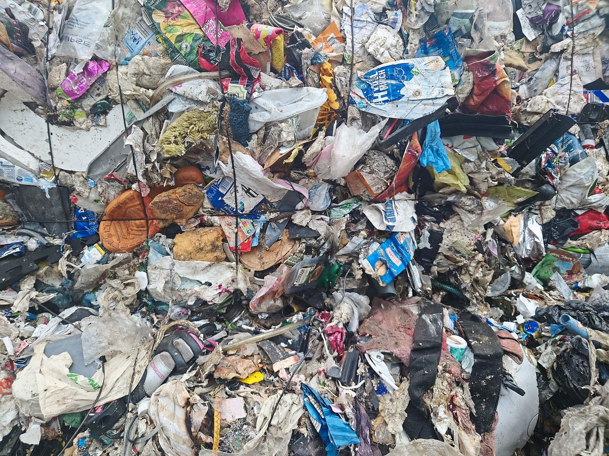 The heaps of waste at the Interzero waste management facility in Berlin. — SIM LEOI LEOI/The Star