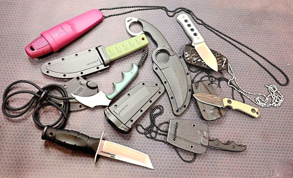 An assortment of neck knives.