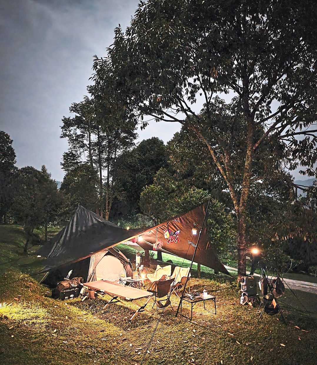 Mid-Autumn Festival lanterns adorning the entrance of the Wong family camp.