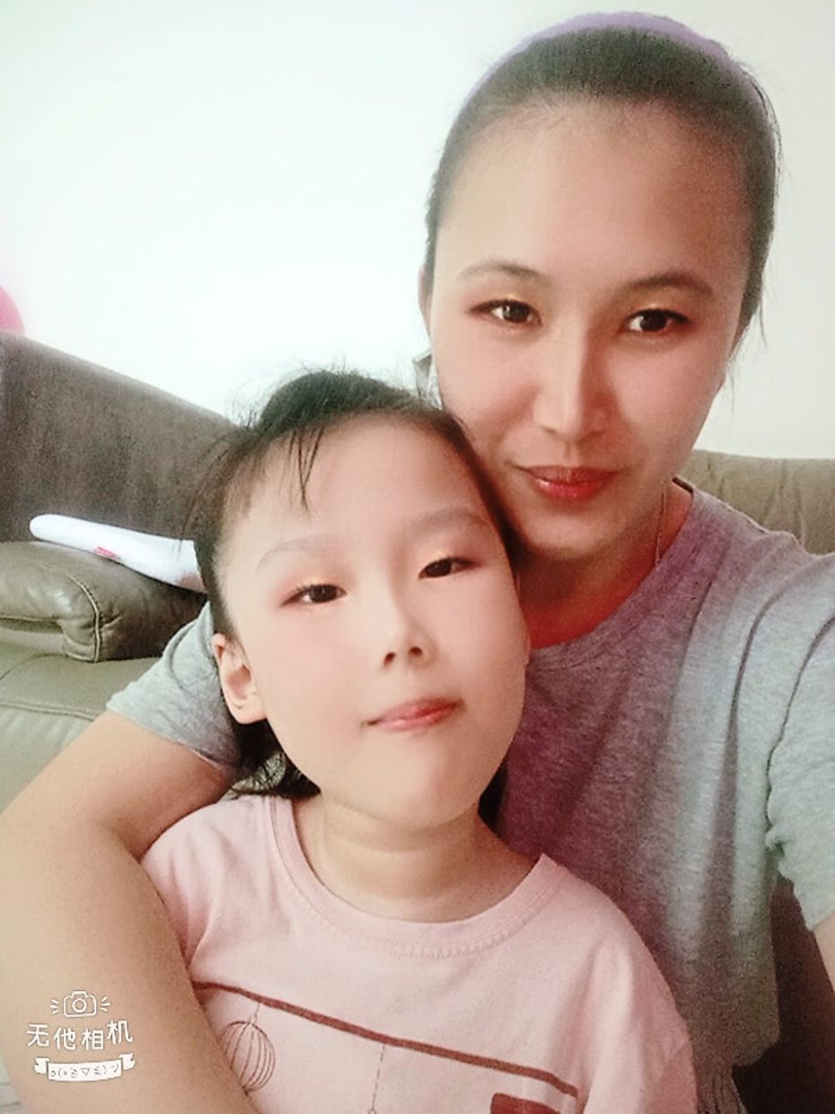 The treatment for Jia Xuan's disease was unaffordable for her family, but she can now access the necessary drugs with the help of Axios' PAP. Jia Xuan is seen here with her mother Voon. — VOON JIAN JIAN